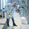 professional-industrial-cleaner-in-protective-uniform-cleaning-floor-of-food-processing-plant-2