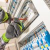 Electrician Finishing Electric Fusebox Board Installation